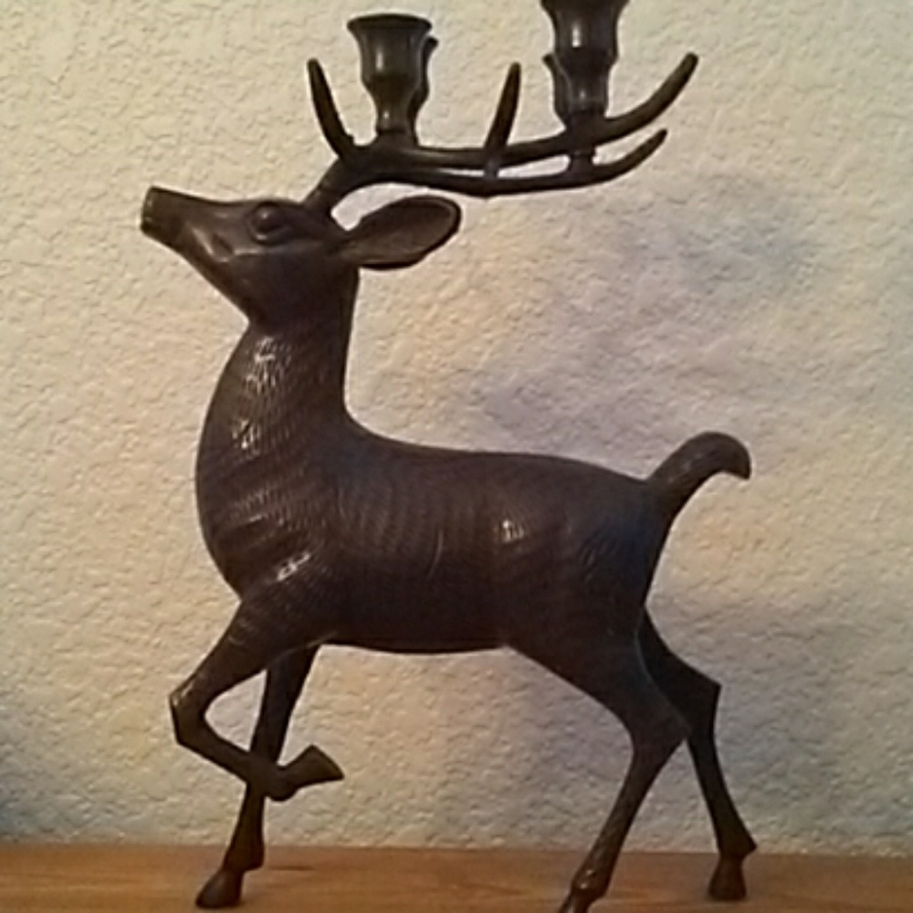 Metal caribu candle hollder